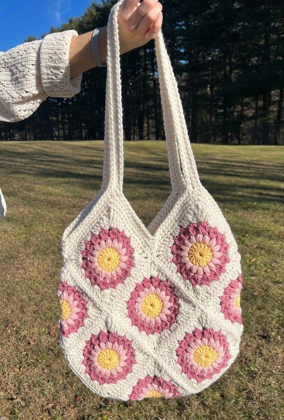 Cream granny square bag with pink and yellow flower motifs