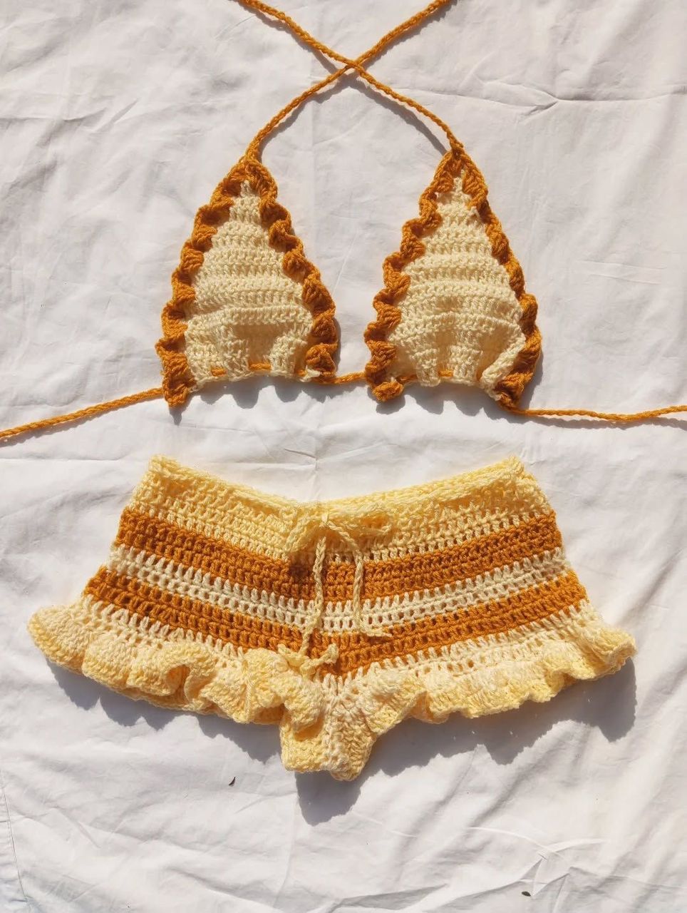 Honey gold and cream crochet bikini top and ruffled shorts set