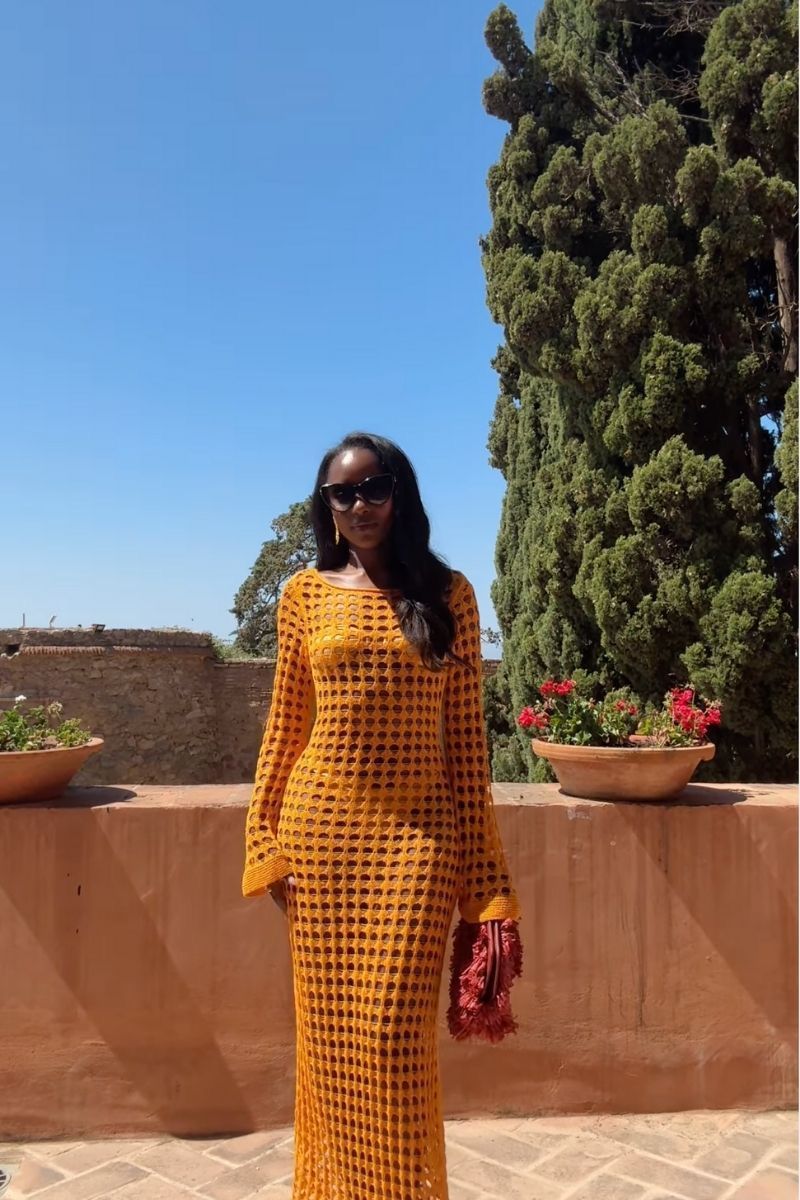 Mustard yellow open-weave crochet maxi dress with bell sleeves